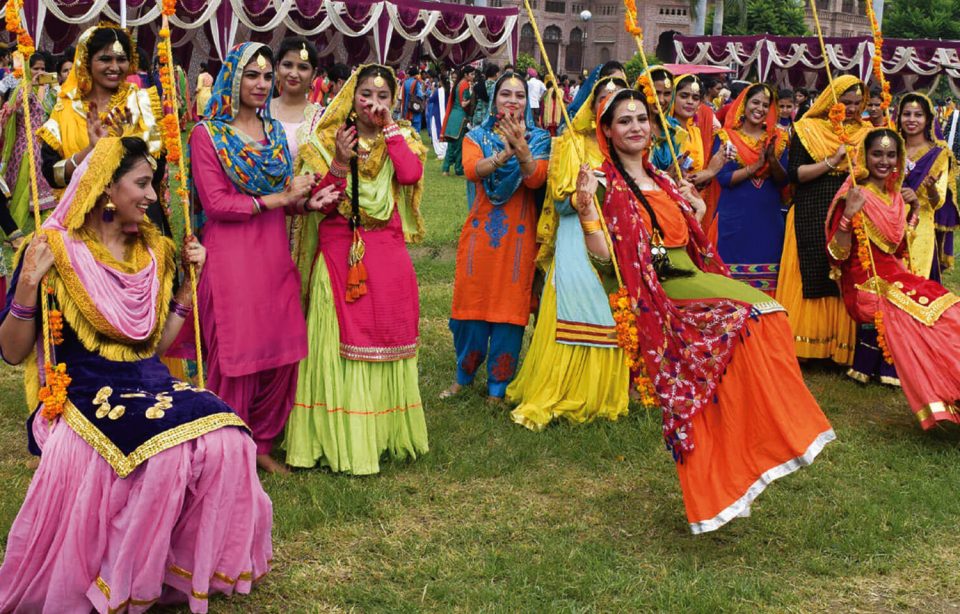 Girls enjoying swinging on the occasion of Hariyali Teej
